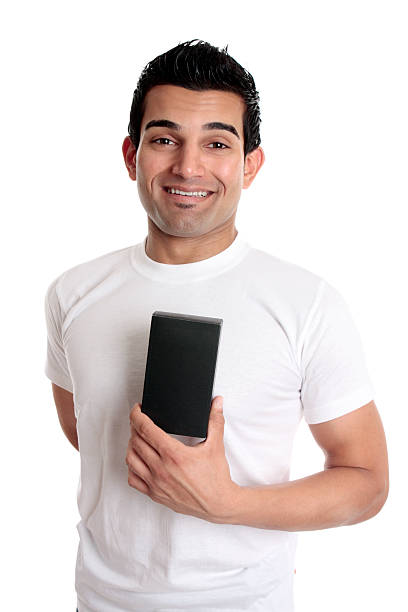 istock Smiling man holding retail product 97493126