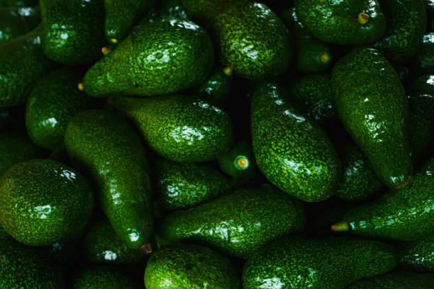 istock Avocado is placed on the floor in black. 974931588