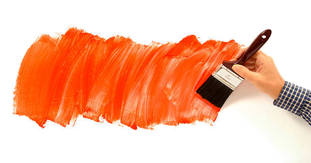 istock Man painting red paint on white wall 97493669