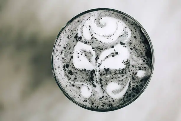 Photo of Beautiful activated charcoal latte