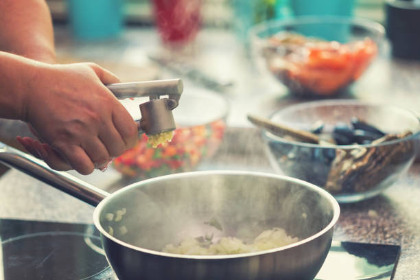 Young Woman Preparing Paella