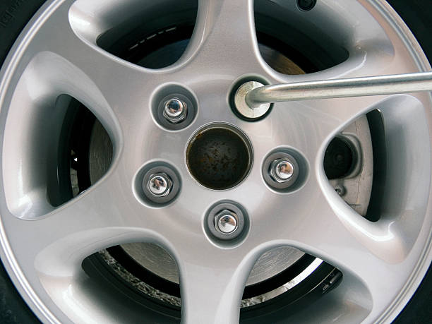 istock Replacement of an automobile wheel 97495115