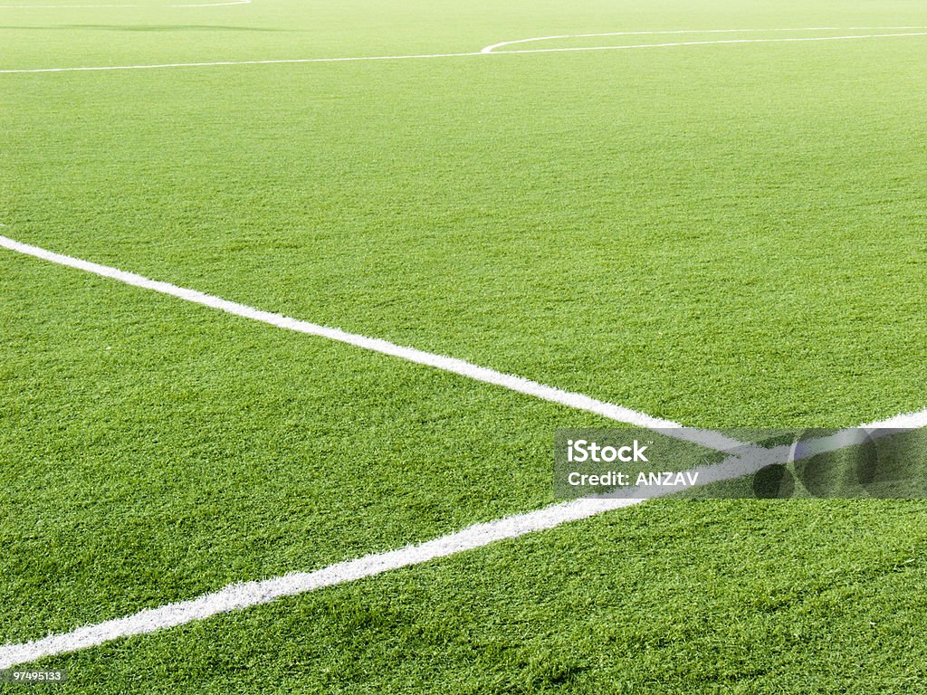 Partial landscape of the white lines on a green soccer field Field for game in football with a green grass and white lines  Backgrounds Stock Photo