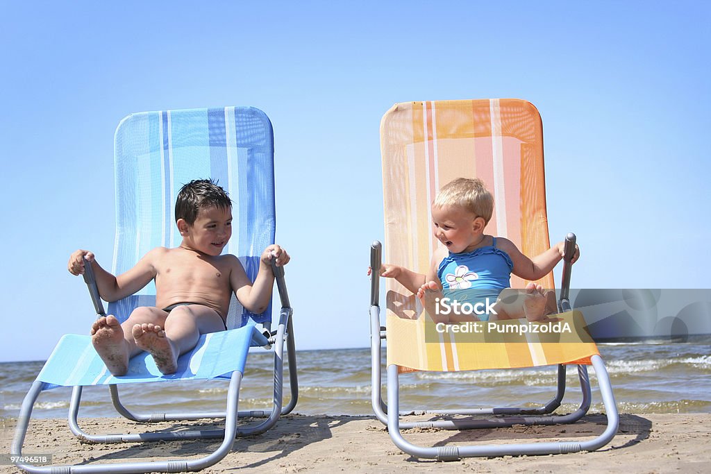 funny little couple  Deck Chair Stock Photo