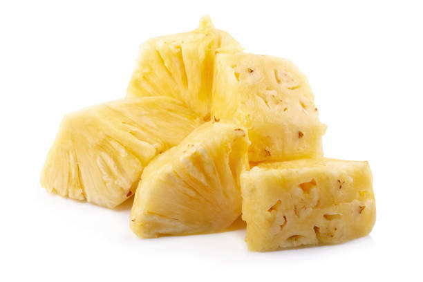 istock Pineapple Sliced isolated on a white background 974967188