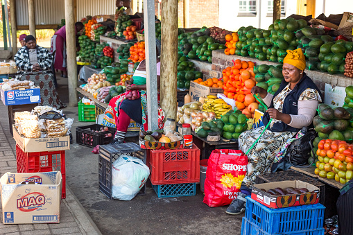 Nelspruit, South Africa, May 29 - 2018: Fruit vendors alongside the road selling fruits and vegetables.