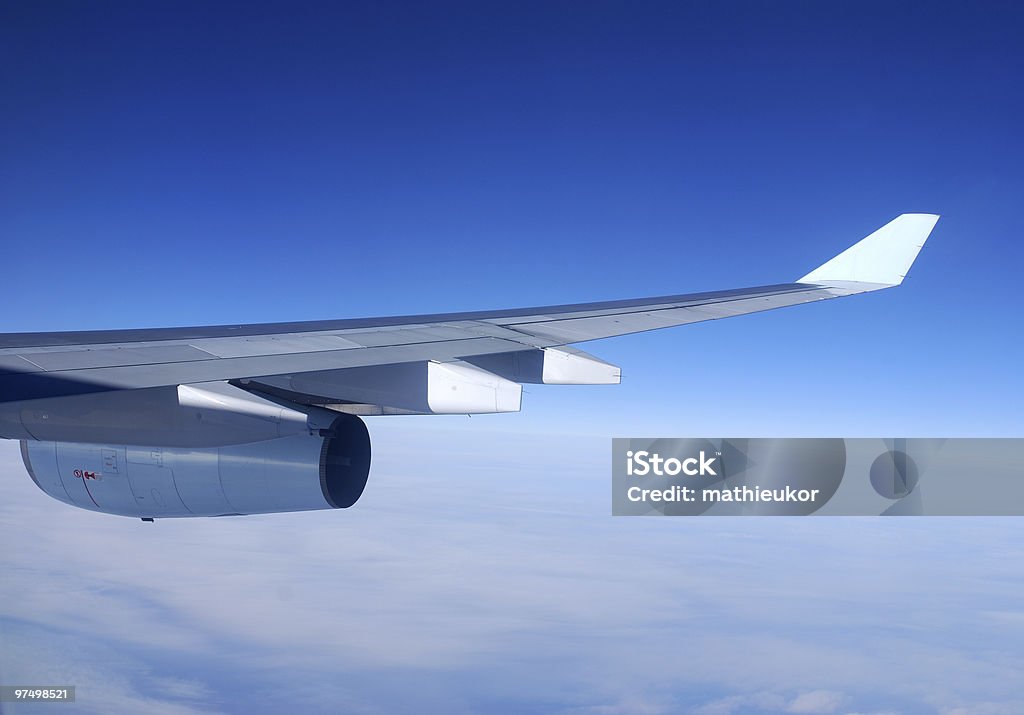 Airplane wing and engine  Airplane Stock Photo
