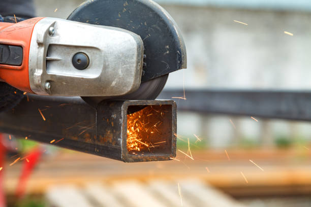 istock Man cuts flex steel products 974997822