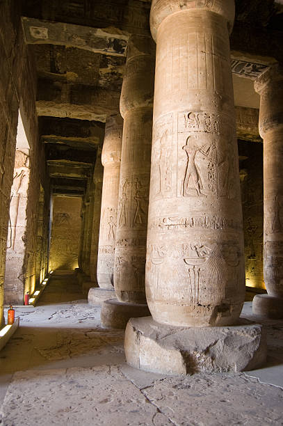 Interior, Temple of Abydos, Egypt View of the First Hypostyle Hall in the Temple of Seti I at Abydos, Egypt.  The Temple is believed to be on the burial site of Osiris, the ancient egptian god of the dead. abydos stock pictures, royalty-free photos & images