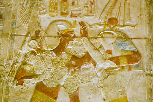istock Ancient Egyptian god Horus annointing Pharoah Seti 97500652