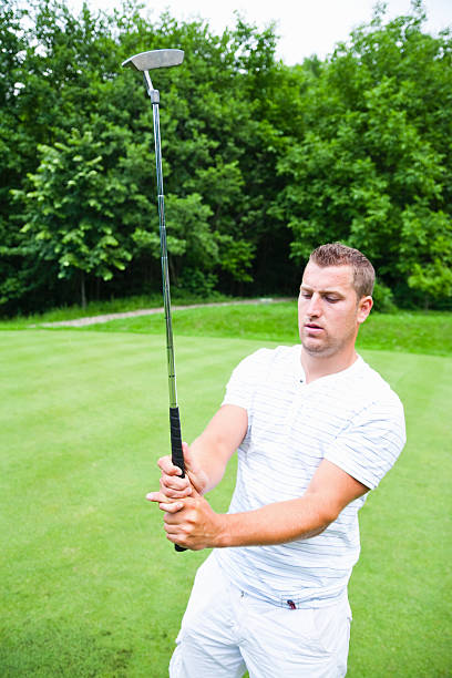 istock Golfer showing club grip 97501124