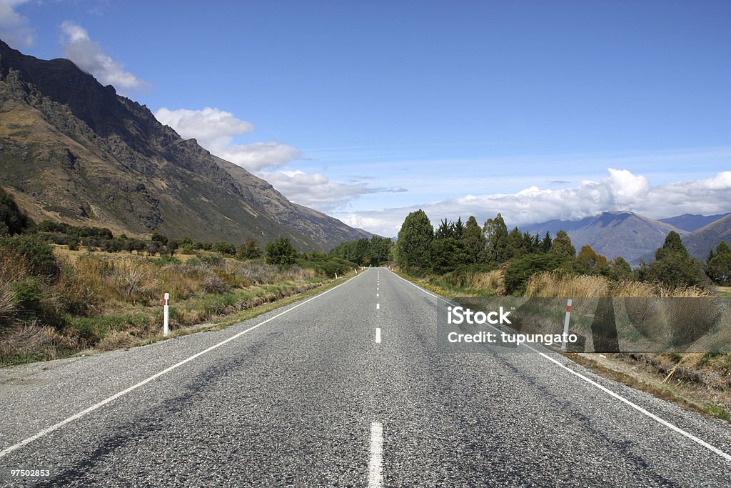Straight road in New Zealand  Asphalt Stock Photo