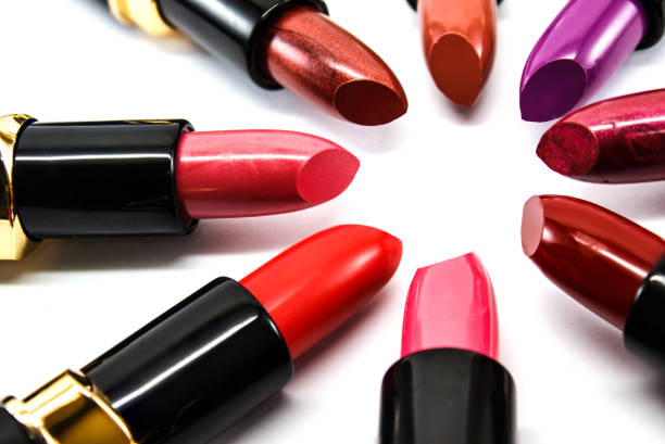 istock High Angle View Of Colorful Lipsticks On White Background 975040716