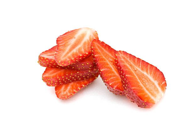 Strawberry slices on white background