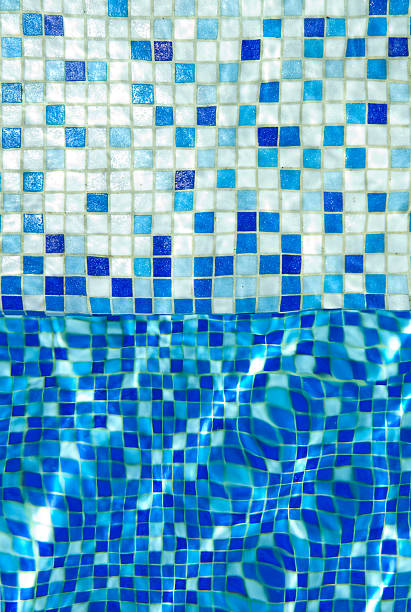 istock swimming pool water with sun reflections 97505598