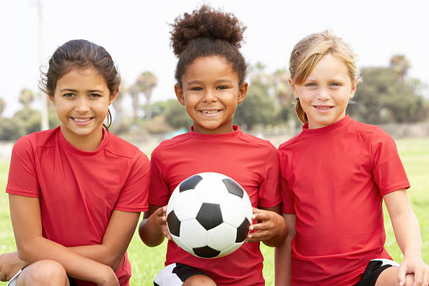 istock Three young girls on a soccer team 97506520