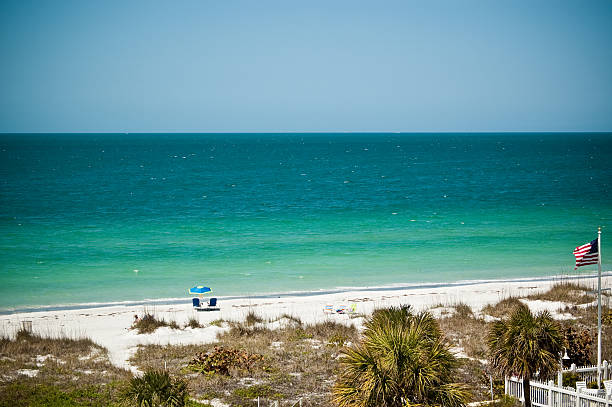 istock Florida Beach Scene with American Flag 97506628