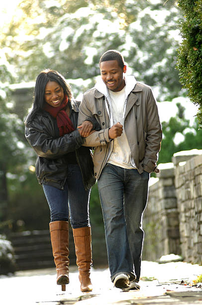 istock Couple going for a walk arm in arm on a cold winter day 97506665