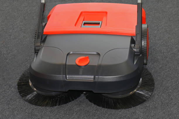 Double brush system sweeper Double brush system sweeper for cleaning house and garden surfaces carpet sweeper stock pictures, royalty-free photos & images