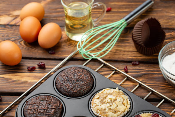 istock The process of making muffins in bright silicone forms. Cooking process. Preparation stage 975098052