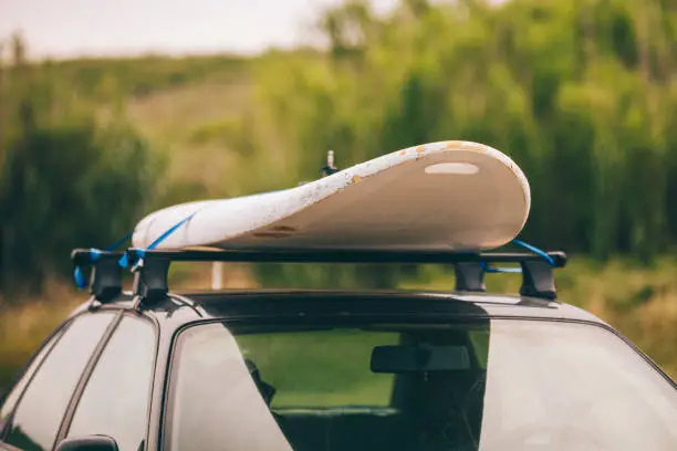 Windsurfing board on the top of the car
