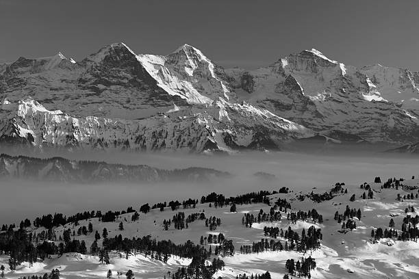 эйгер, mönch & юнгфрау - eiger mountain swiss culture photography стоковые фото и изображения
