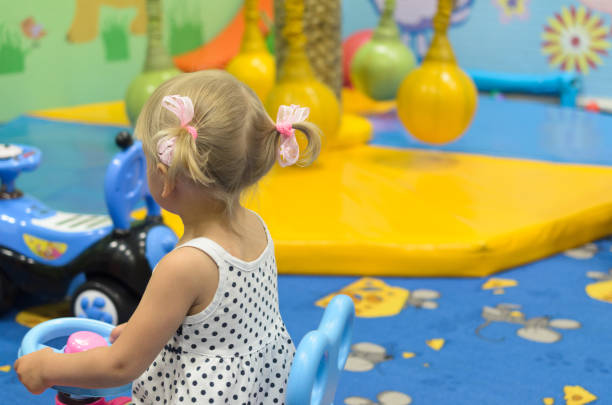 istock Children have fun in the children's playroom. 975100896