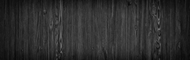 istock dark wood background, black texture pattern natural wooden planks 975103402