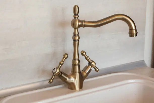 Photo of Vintage retro bronze water tap faucet