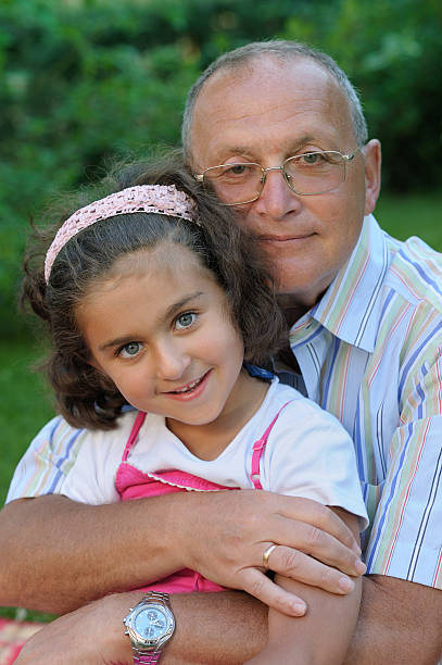Grandfather and child stock photo