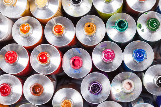 istock Top view of open professional paints in tubes. Multicolor 975106776