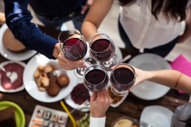 istock Friends Toasting Wineglasses 975117940