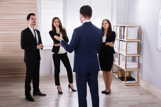 istock Manager With His Colleague Having Discussion 975123058