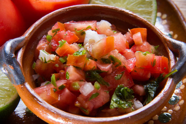 istock Mexican pico de gallo and ingredients 975129256