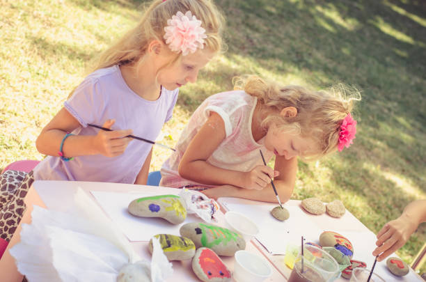istock kids painting on the table 975130166