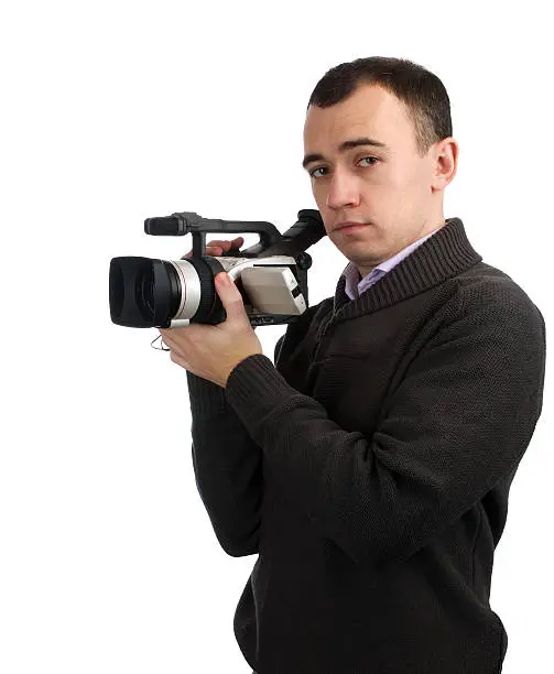 Young man with a modern digital camera