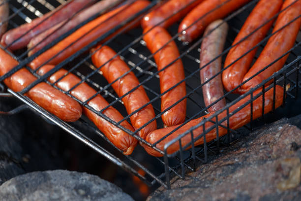 istock Sausage fire-roasted on the grill 975146960