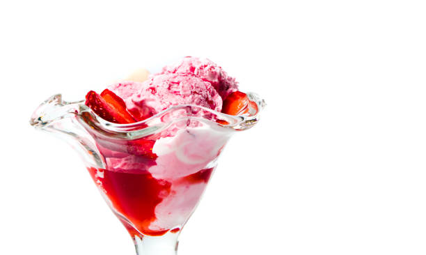 istock Strawberry ice cream in a cup isolated 975154580