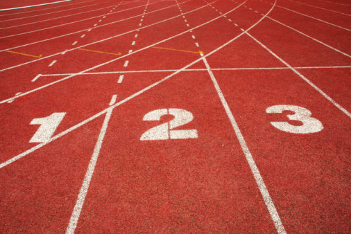number on running track finish line