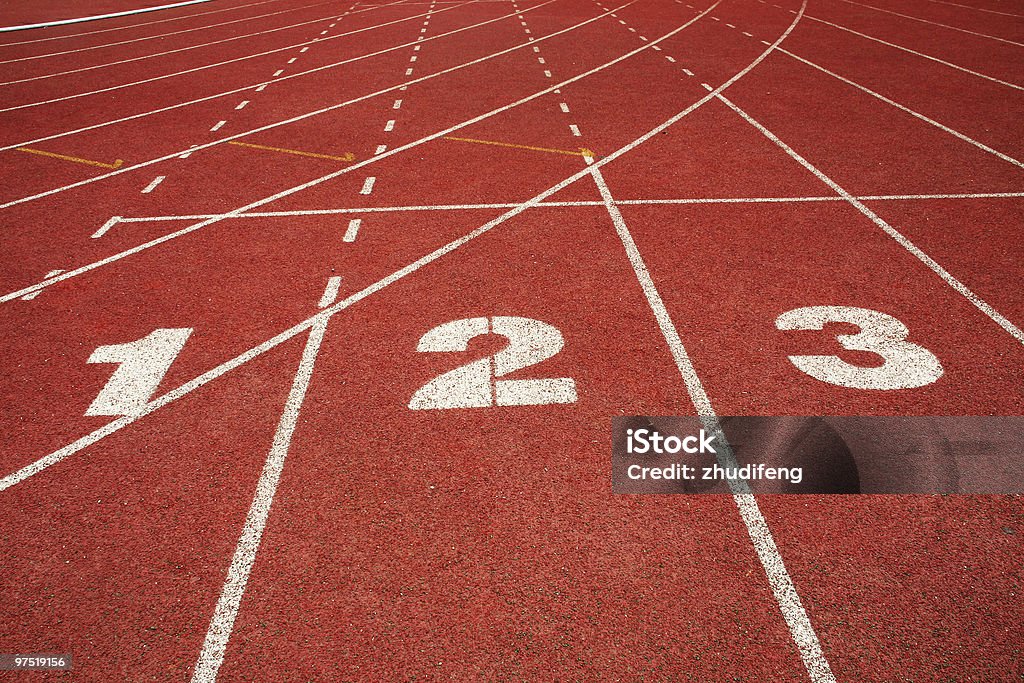 Numeration on running track starting line number on running track finish line Running Track Stock Photo