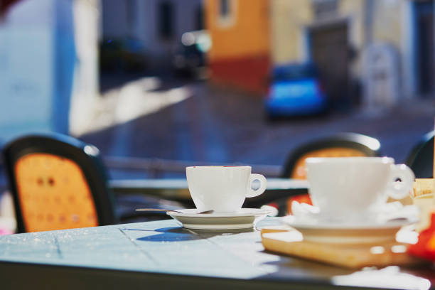 istock Coffee cups on table of cafe or restaurant 975195944