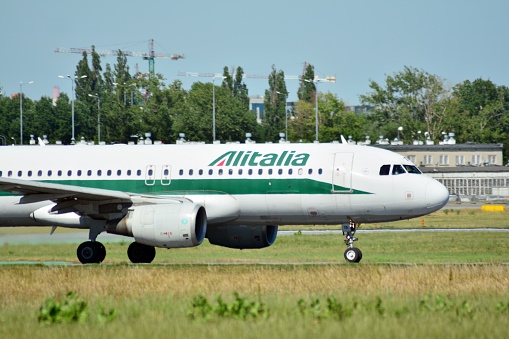 Warsaw, Poland. 8 June 2018. Passenger airplane EI-DTA - Airbus A320-216 - Alitalia is flying from the runway of Warsaw Chopin Airport