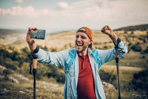 istock Smiled selfie shoot on the top of mountain 975204230