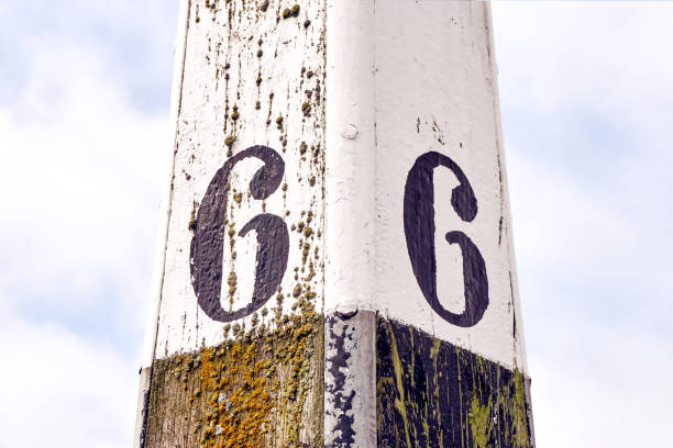 istock Mooring post with number six painted on each side 975204650