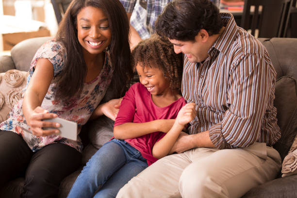 istock Multi-ethnic family having fun at home. 975205206