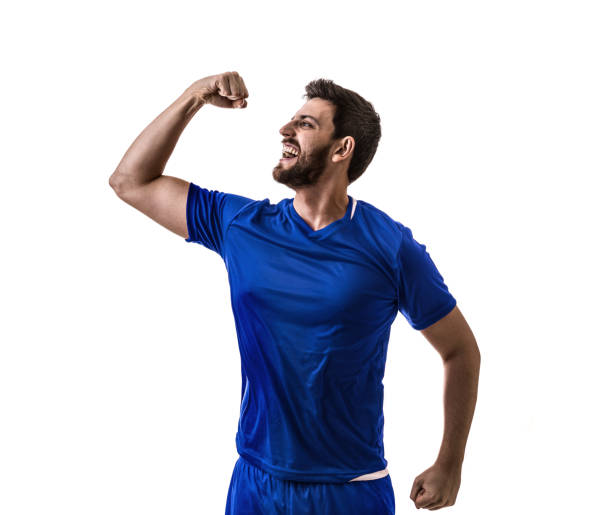 istock Male athlete / fan in blue uniform celebrating on white background 975205712