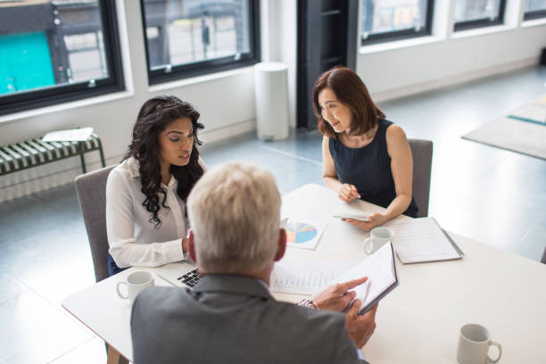 istock Explaining to colleagues the new start up plan 975214790