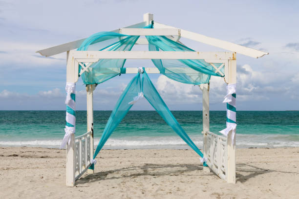 istock Wedding gazebo on the beach, Cuba, Varadero 975216976