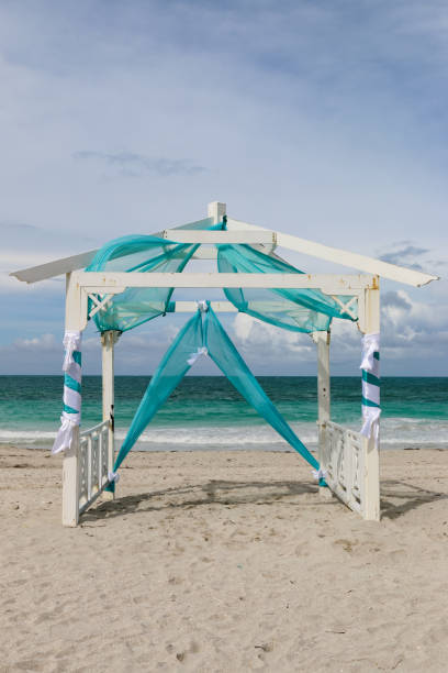 istock Wedding gazebo on the beach, Cuba, Varadero 975217592