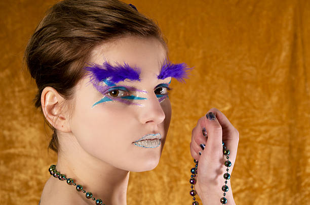 istock Glamour girl holding beads on gold. 97521886